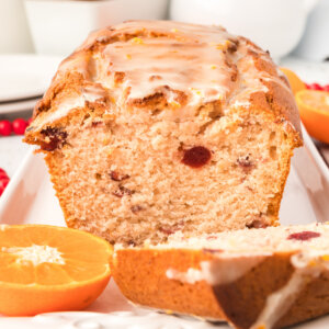 cut loaf of orange cranberry bread