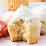 closeup of eggnog cupcake with bite taken out