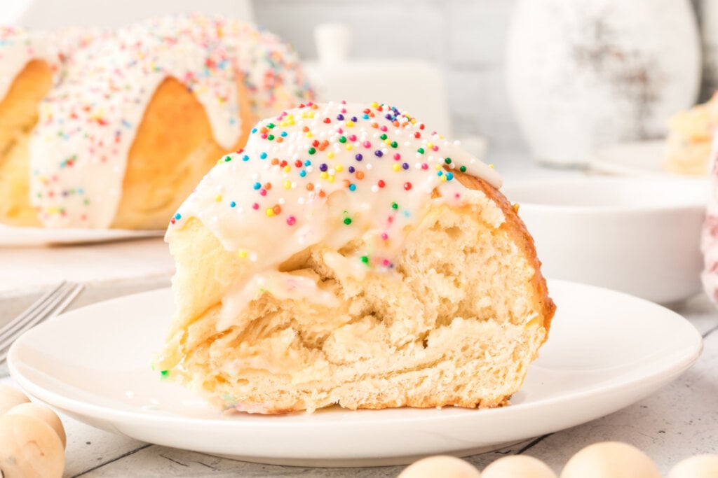 slice if frosted italian anise bread on white plate