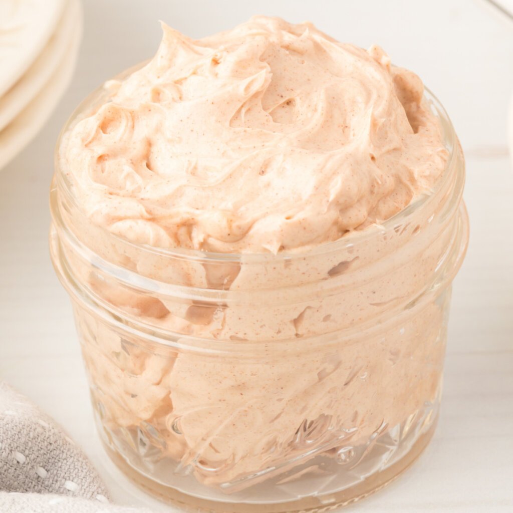 closeup of cinnamon butter in glass jar