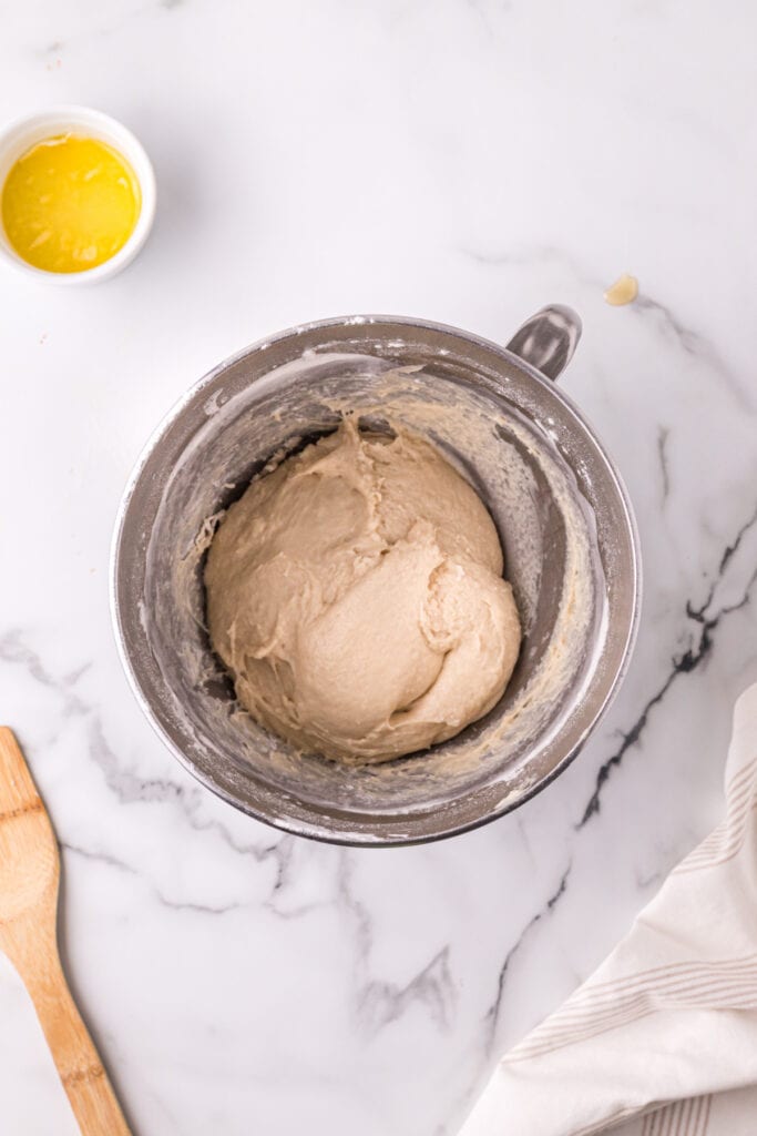 Mixed dough in a bowl for homemade Texas Roadhouse rolls