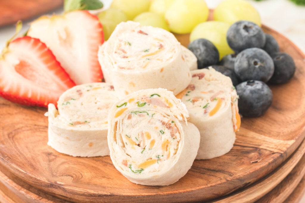 cut chicken bacon ranch pinwheels with assorted fruit