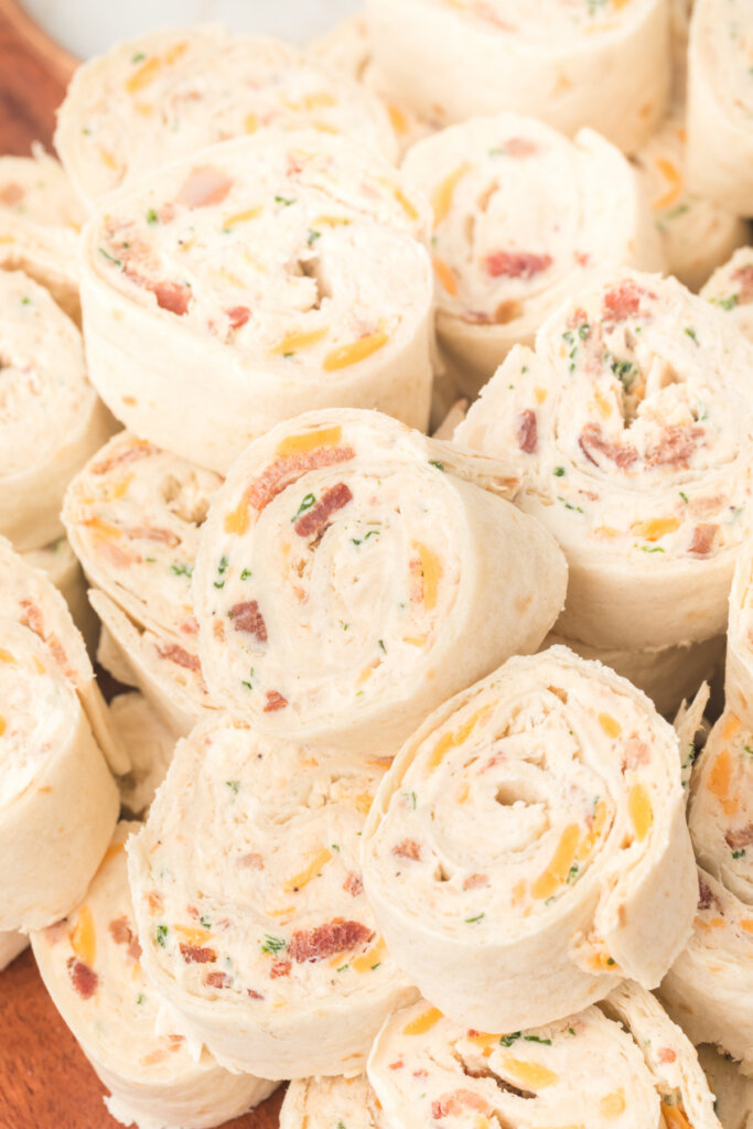 chicken bacon ranch tortilla roll-ups stacked on top of each other