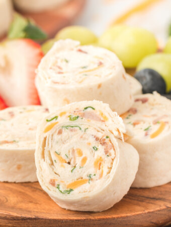 chicken bacon ranch tortilla roll-ups on wooden board