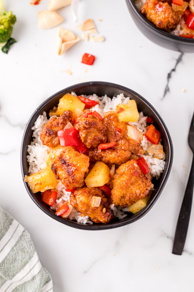 looking down into a bowl with sweet fire chicken