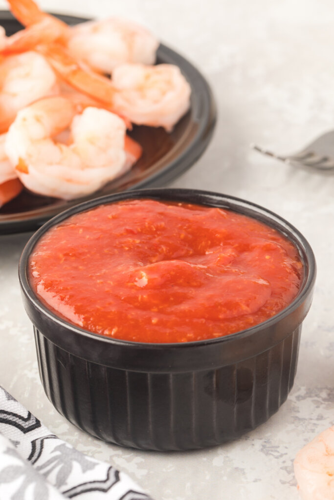 homemade shrimp cocktail sauce in black ramekin