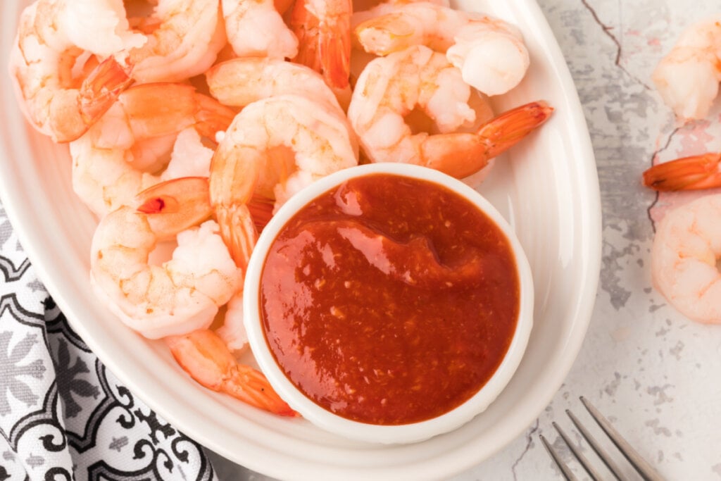 shrimp cocktail sauce on plate with chilled shrimp