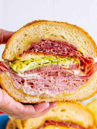 hand holding italian subs