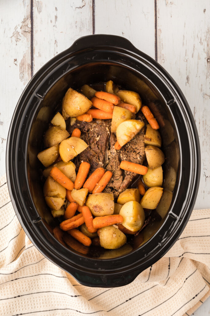 pot roast with potatoes and carrots in crock pot