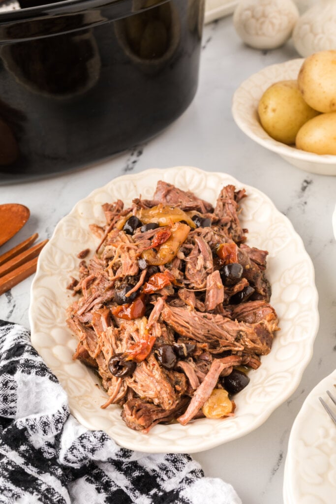 slow cooker mediterranean pot roast on platter