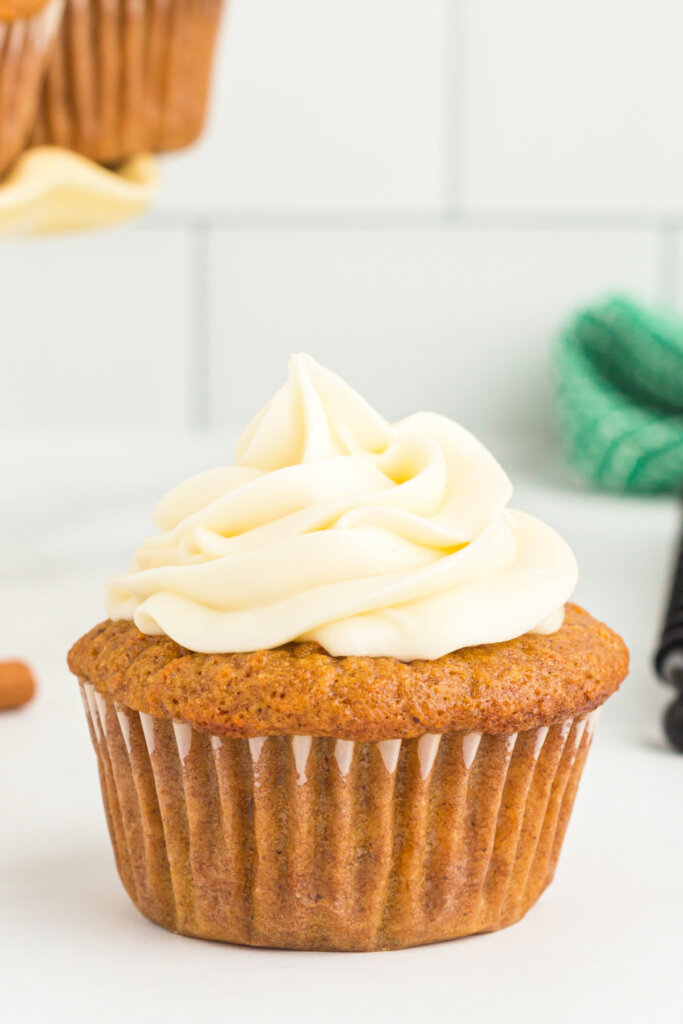 closeup of carrot cupcake with cream cheese frosting