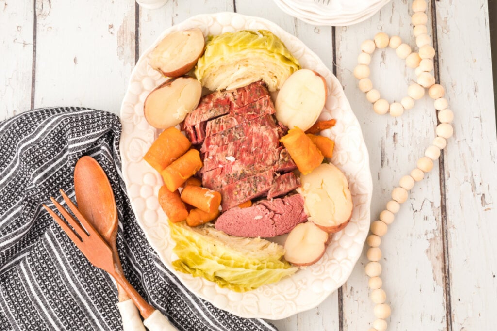 platter with corned beef, cabbage, potatoes, and carrots