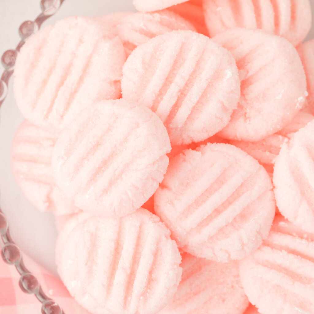 closeup of pink cream cheese mints