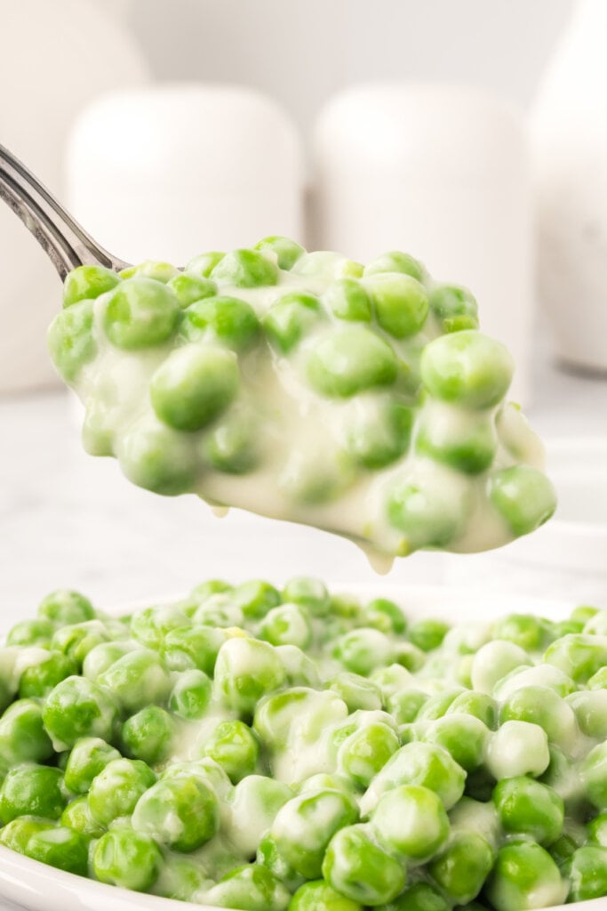 creamed peas on spoon