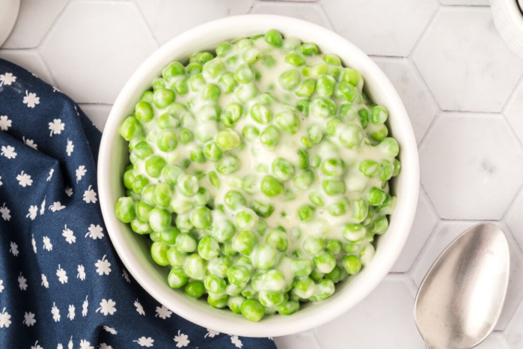 looking down into a bowl of creamed peas