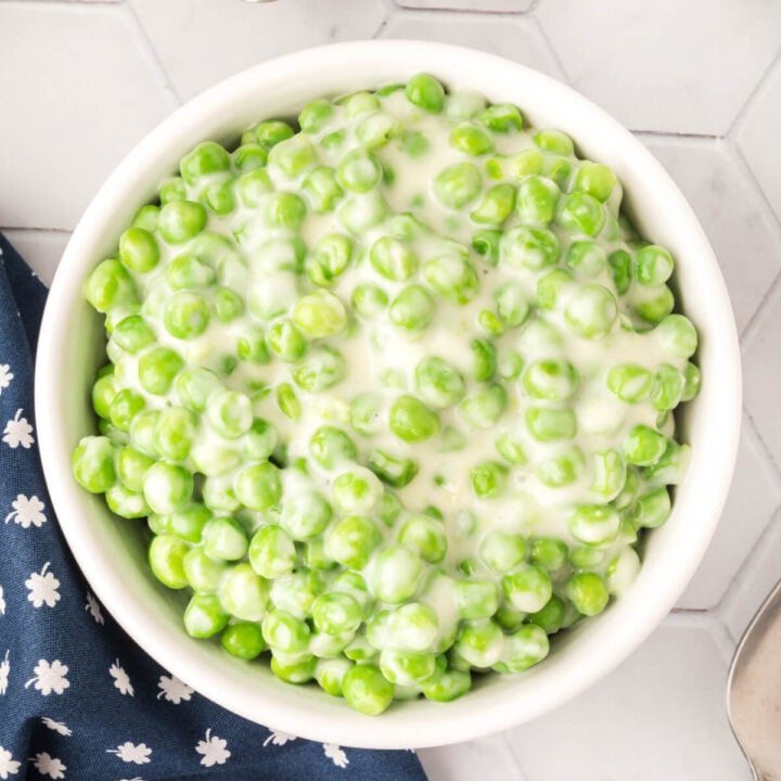 white bowl with creamed peas