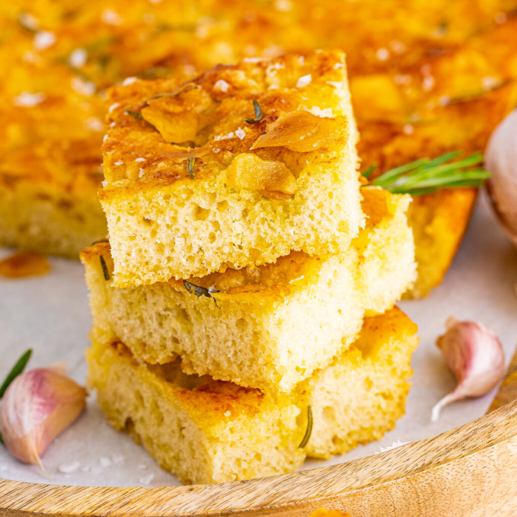 three slices of rosemary focaccia stacked