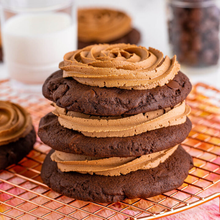 three frosted chocolate cake cookies stacked