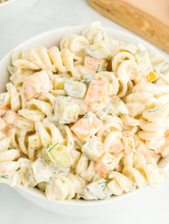 finished dill pickle pasta salad in serving bowl