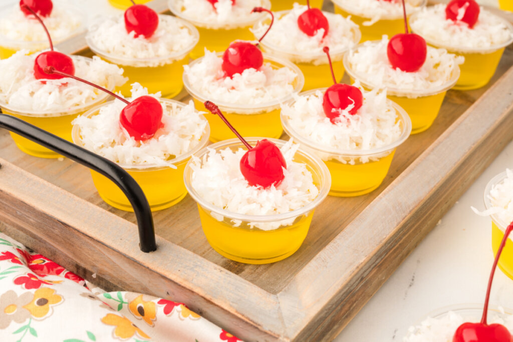 gelatin shots on a wooden tray