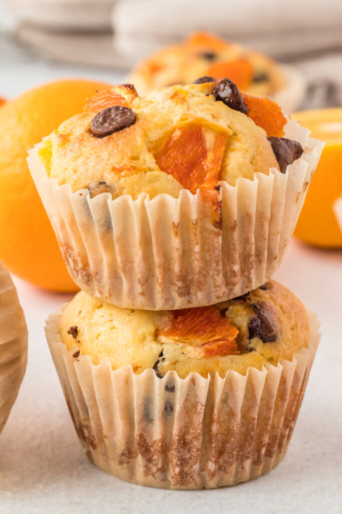 two orange muffins stacked