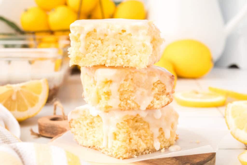 three lemon brownies stacked on top of each other