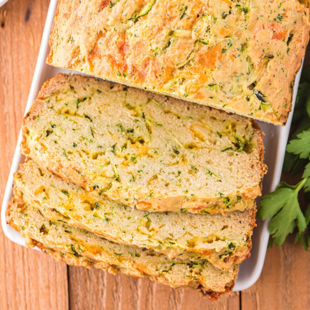 cheesy zucchini bread with a few slices cut