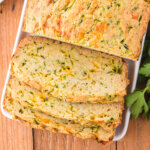 cheesy zucchini bread with a few slices cut