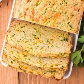 cheesy zucchini bread with a few slices cut