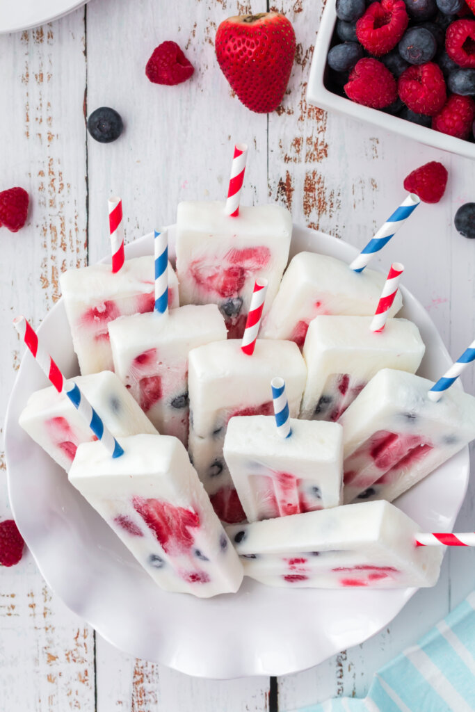 patriotic berry popsicles on end in bowl