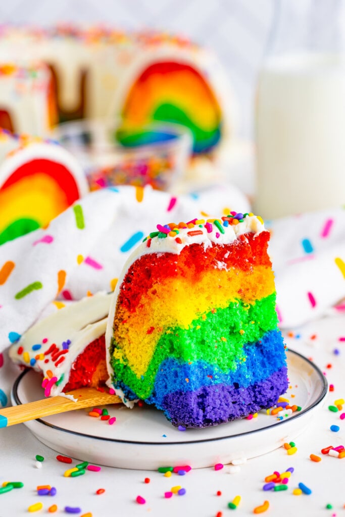 rainbow bundt cake slice on plate