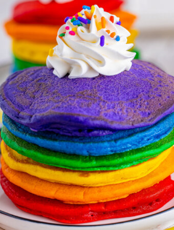 closeup of rainbow pancakes on plate