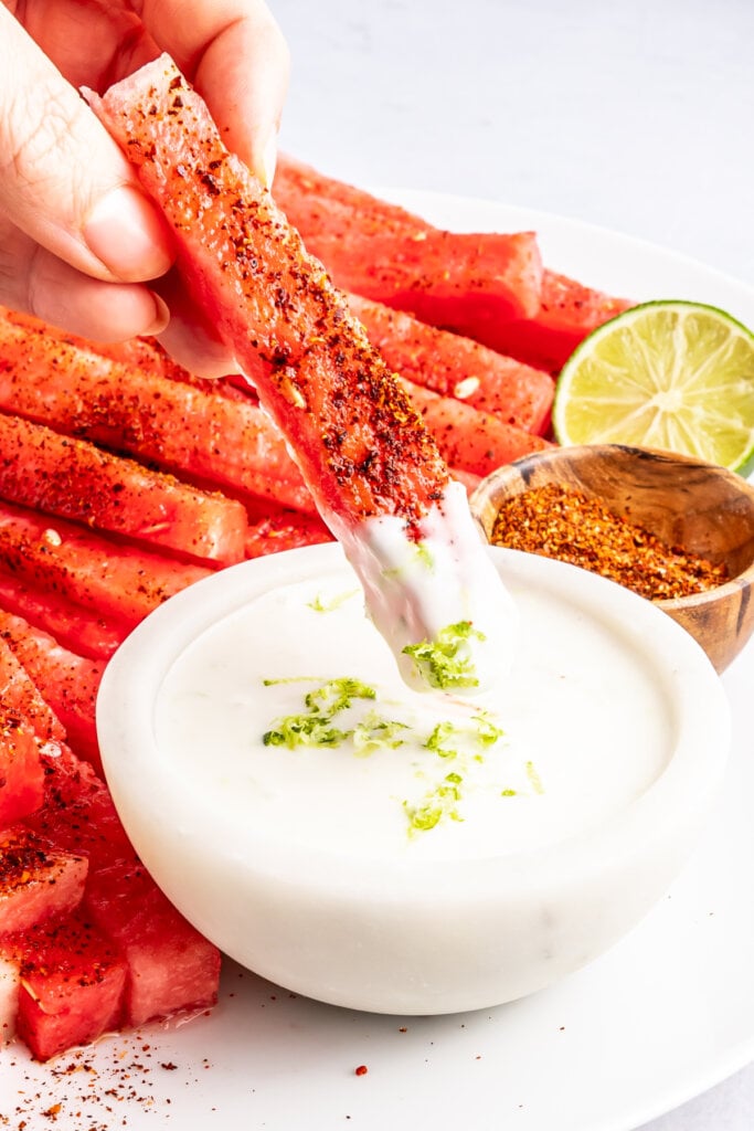 spicy watermelon fry after being dipped into the sweet and creamy coconut lime dipping sauce