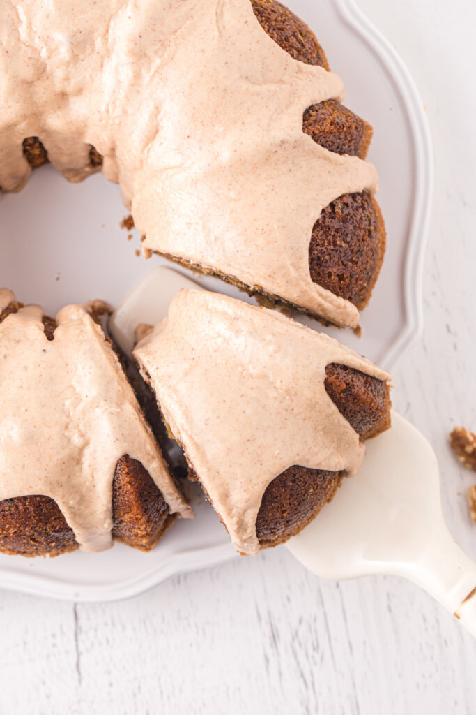 spatula taking a slice of bundt cake