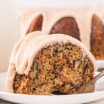 closeup of a slice of zucchini bundt cake on plate