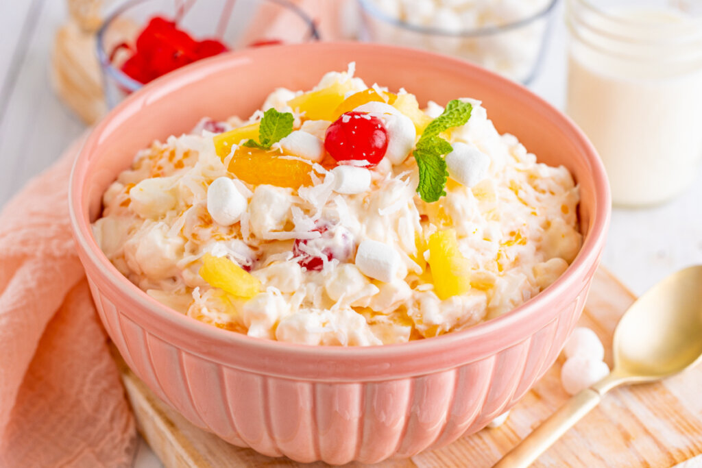 ambrosia salad in pink bowl
