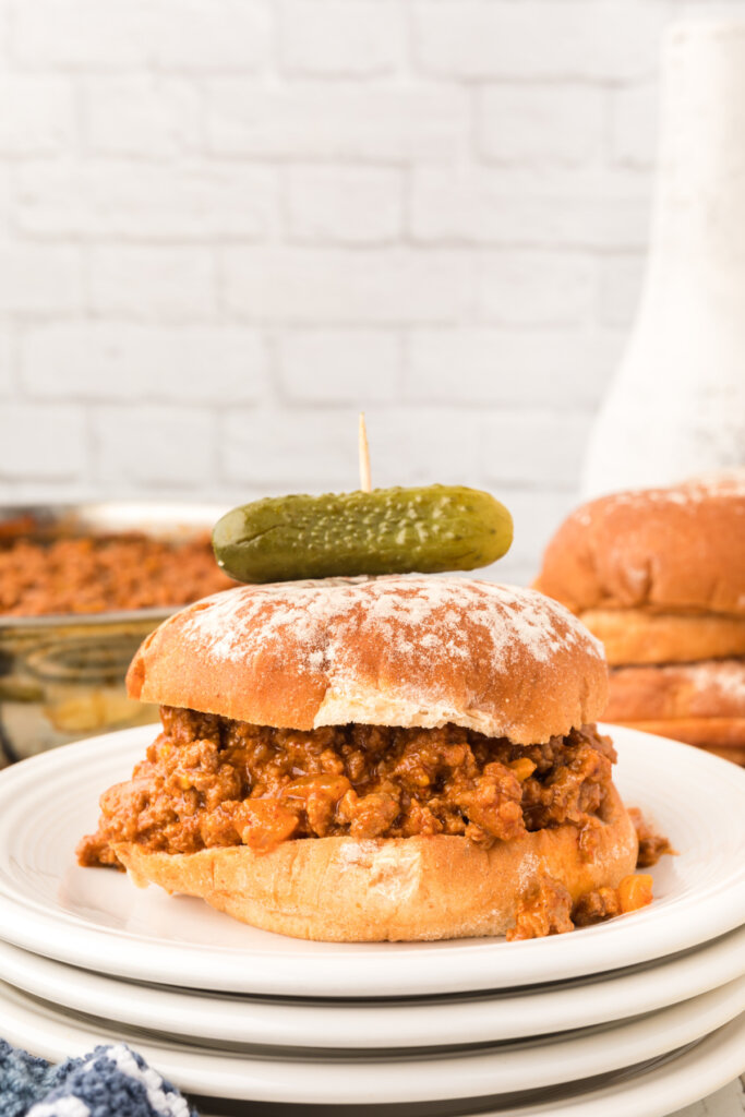 chili cheese sloppy joe with a pickle