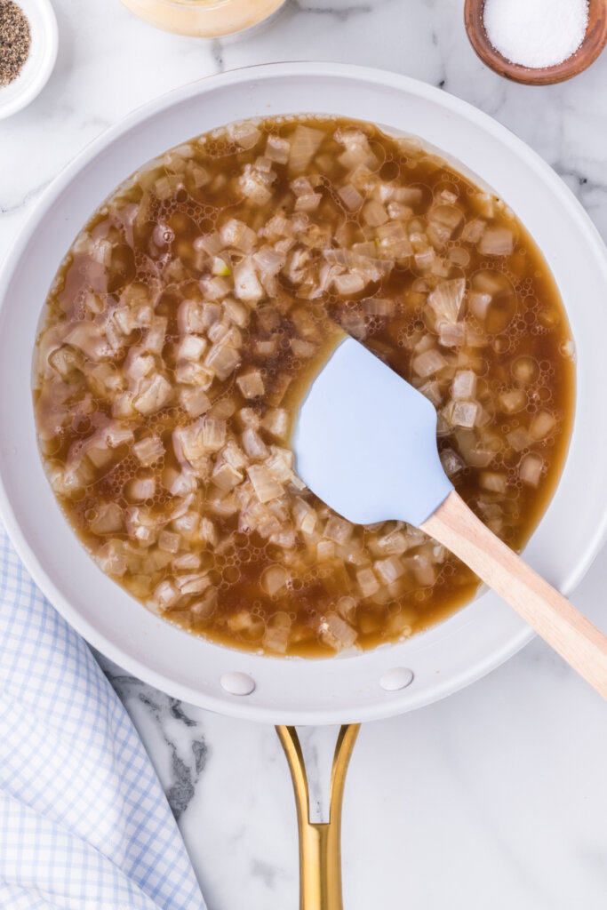 hot german potato salad dressing in pan