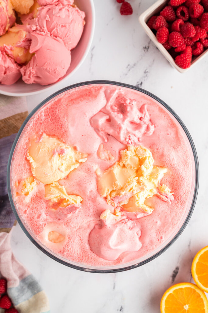 looking down into a punch bowl filled with sherbet punch