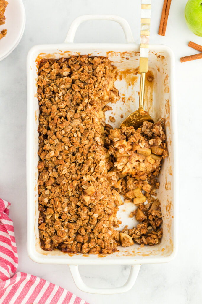 looking down onto a casserole dish with apple cinnamon roll bake