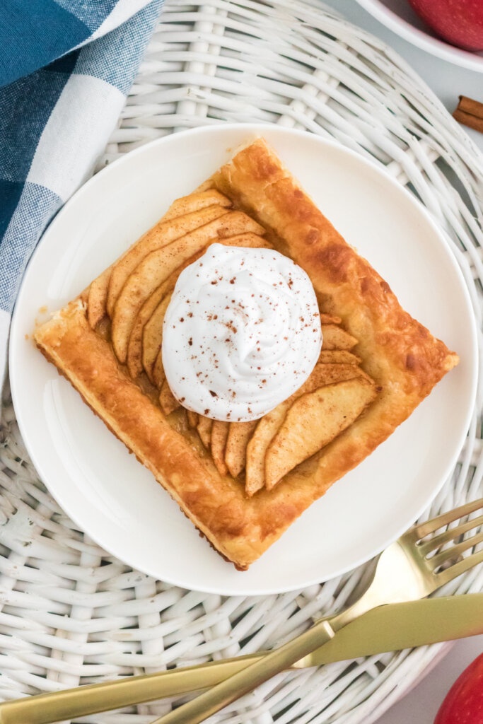 looking down onto a slice of apple tart on plate