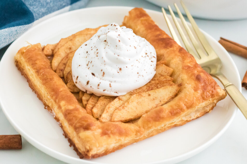 apple tart slice on white plate