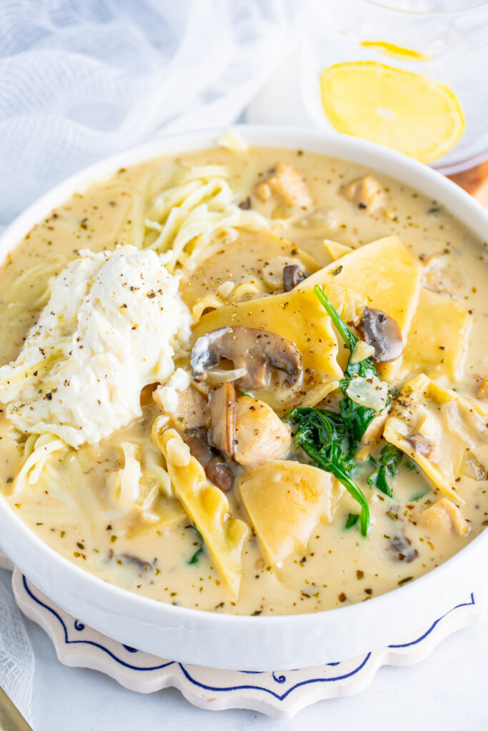 closeup of chicken alfredo lasagna soup in bowl