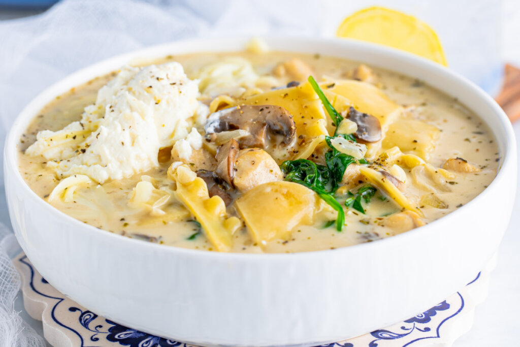 chicken alfredo lasagna soup in white bowl