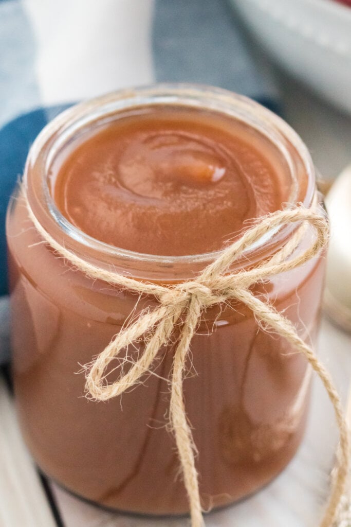 closeup of instant pot apple butter in glass jar