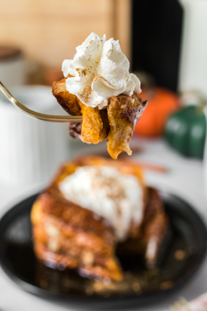 bite of pumpkin spice french toast on fork