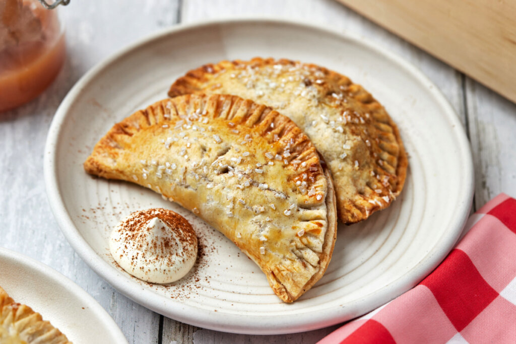 two apple hand pies on a plate