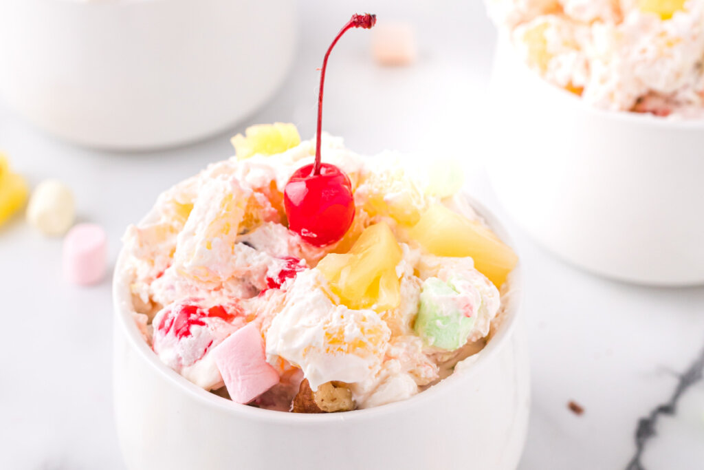 creamy pineapple fluff in white bowl