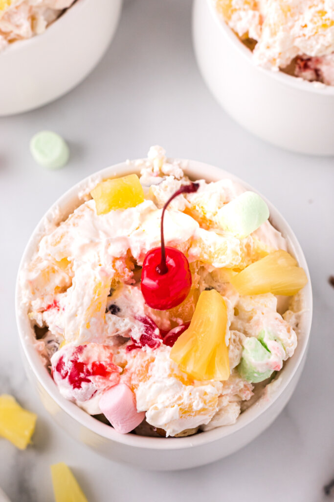 looking down into a bowl filled with creamy pineapple fluff