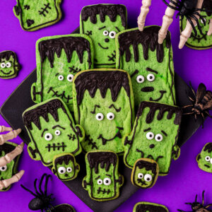 decorated frankenstein sugar cookies on plate